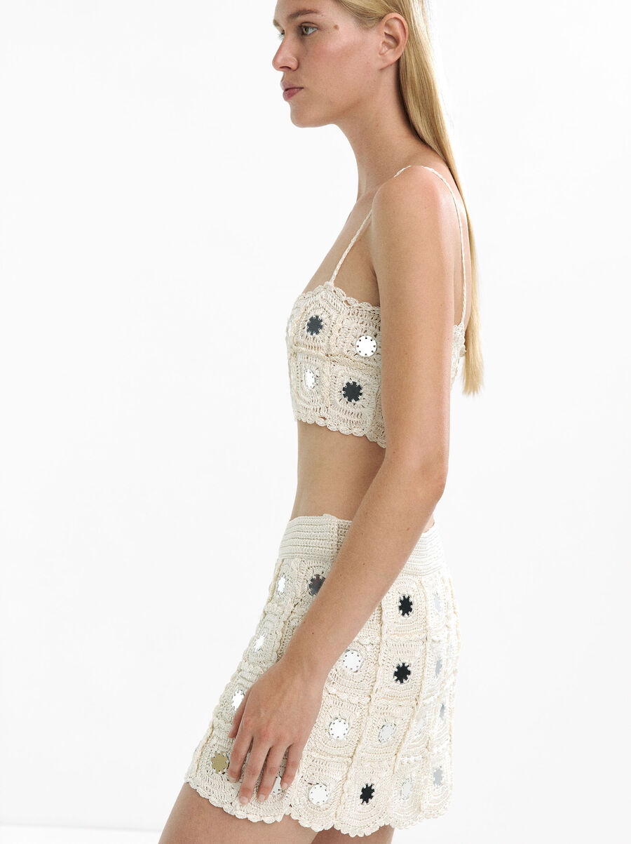 Short knitted skirt with mirror detail