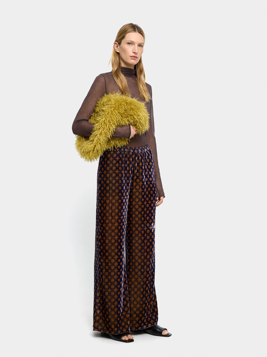 Velvet trousers with printed circles
