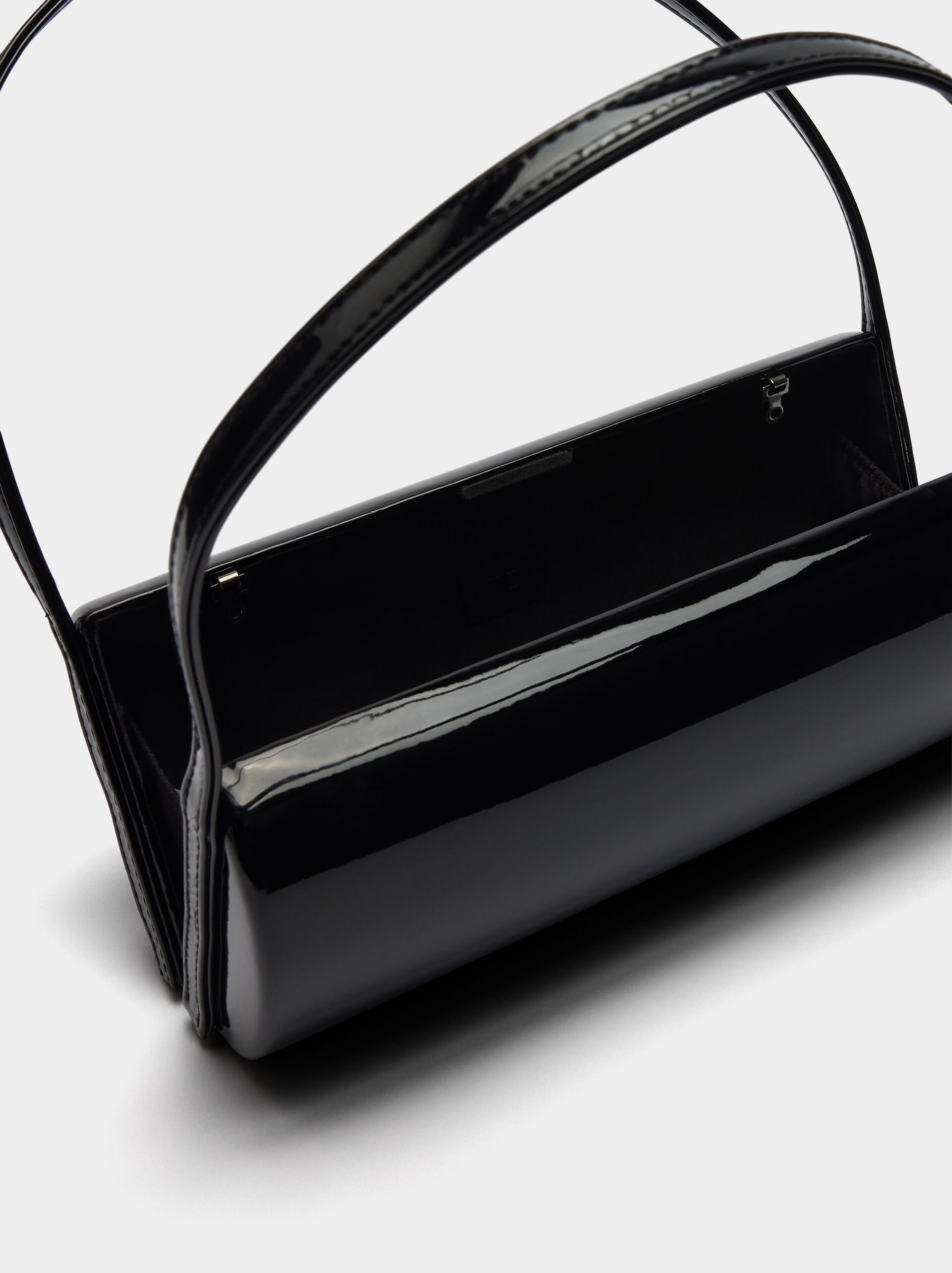 Cylindrical patent party clutch image number 3.0