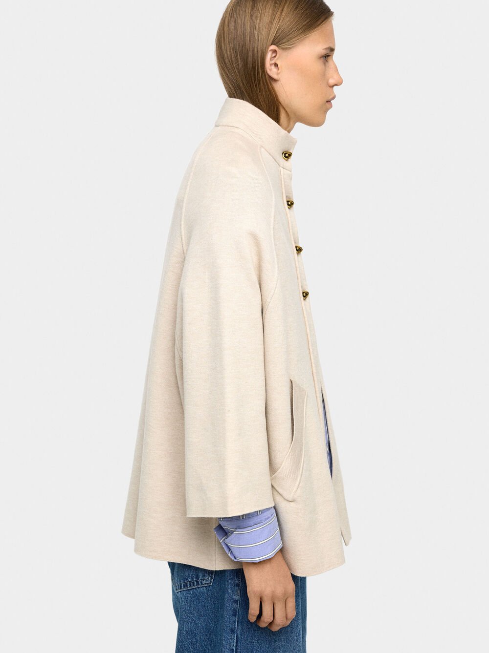 Knit poncho with high neck