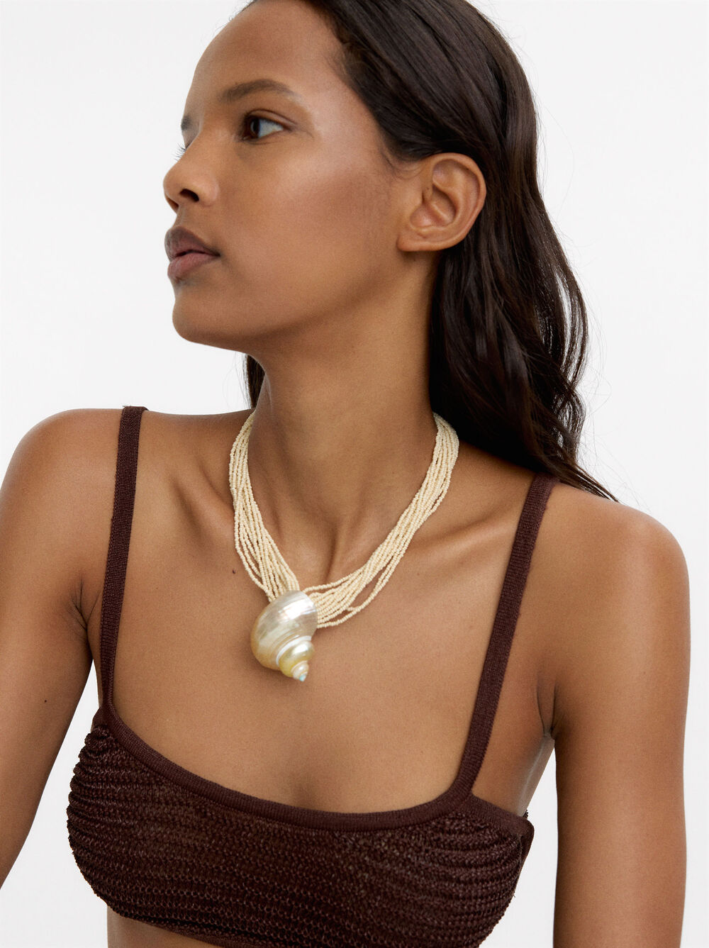 Multi-strand necklace with shell