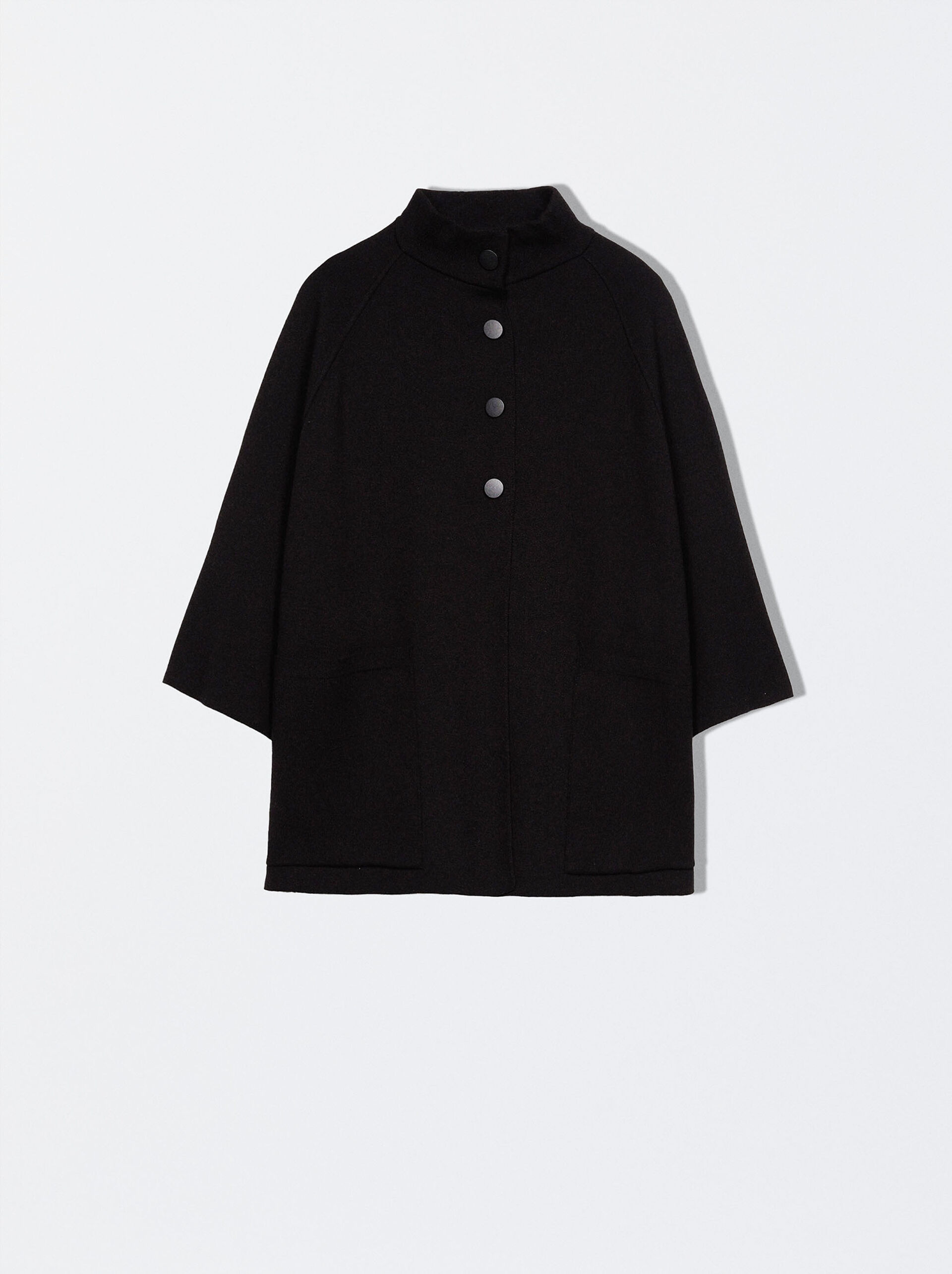 Knitted poncho with buttons image number 0.0
