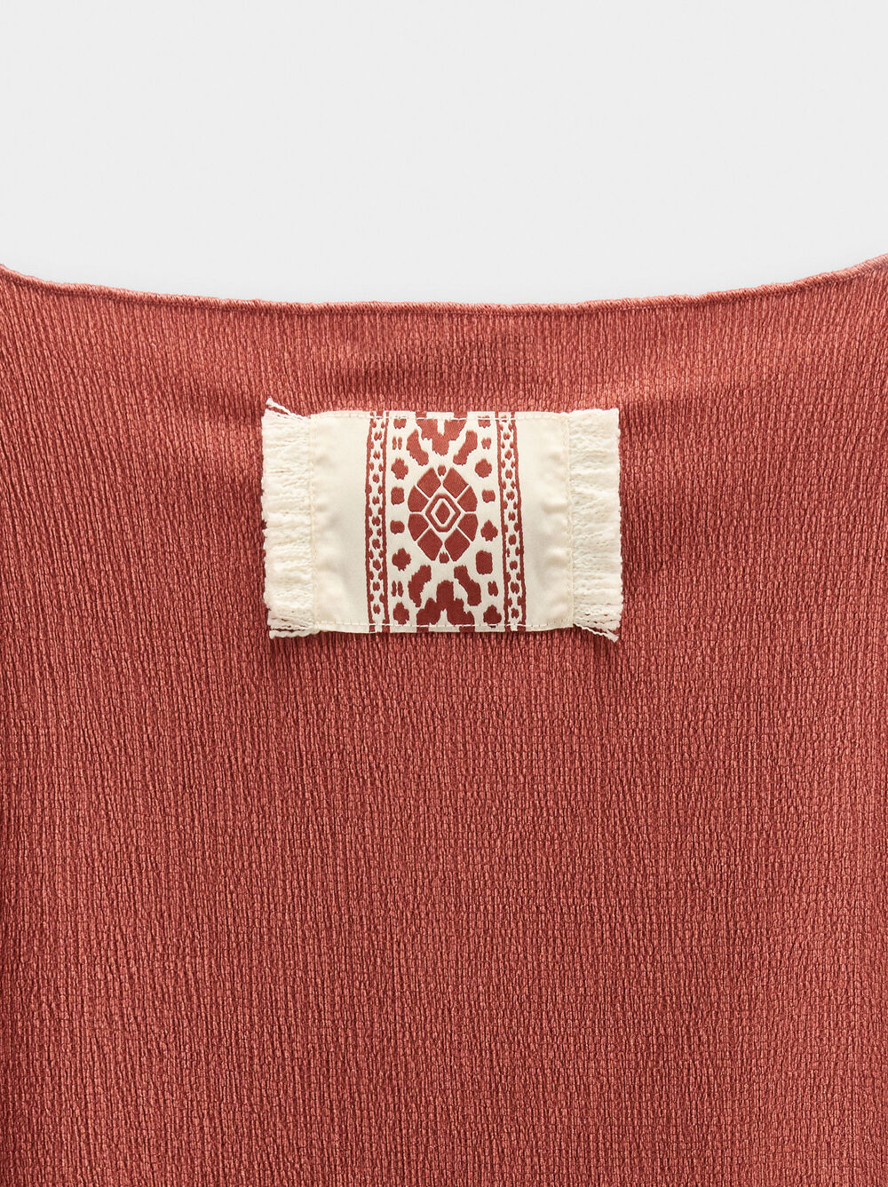 Blusa effetto stropicciato