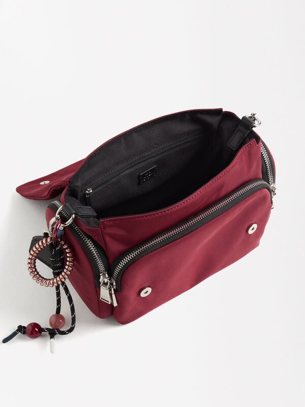 Crossbag with flap closure