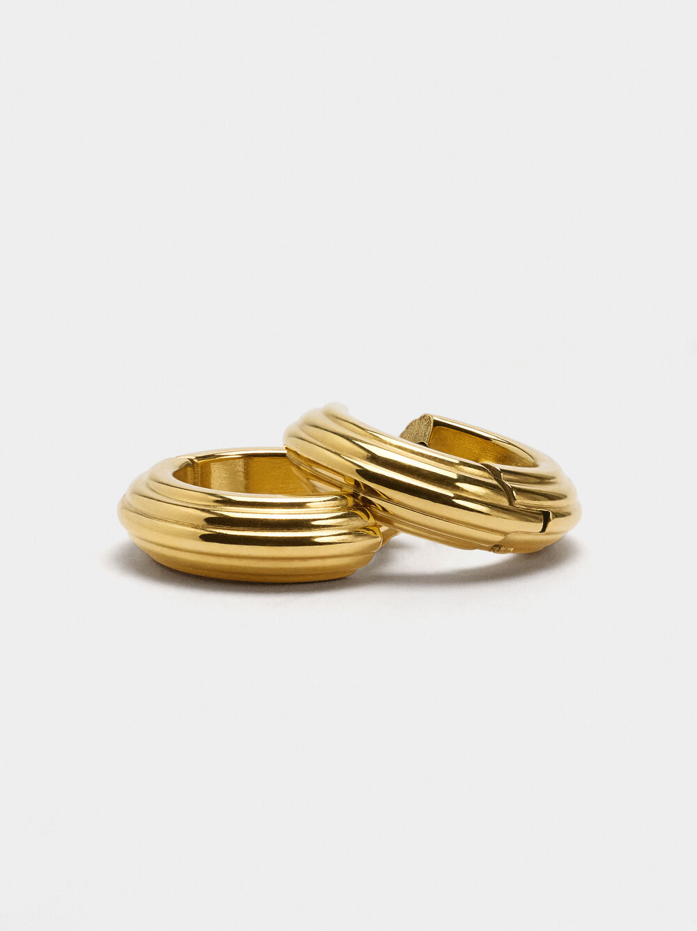 Hoop earrings with embossed stripes - stainless steel