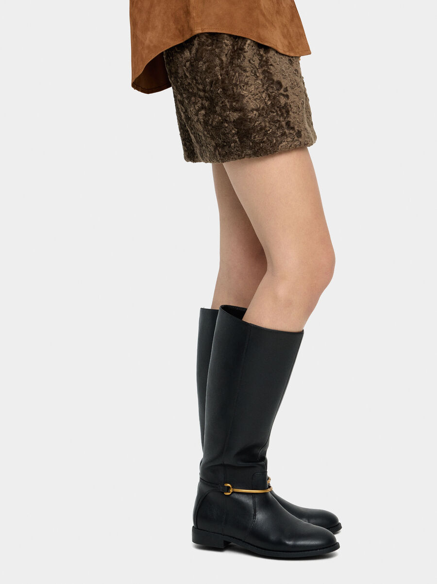 Botas altas con detalle metálico