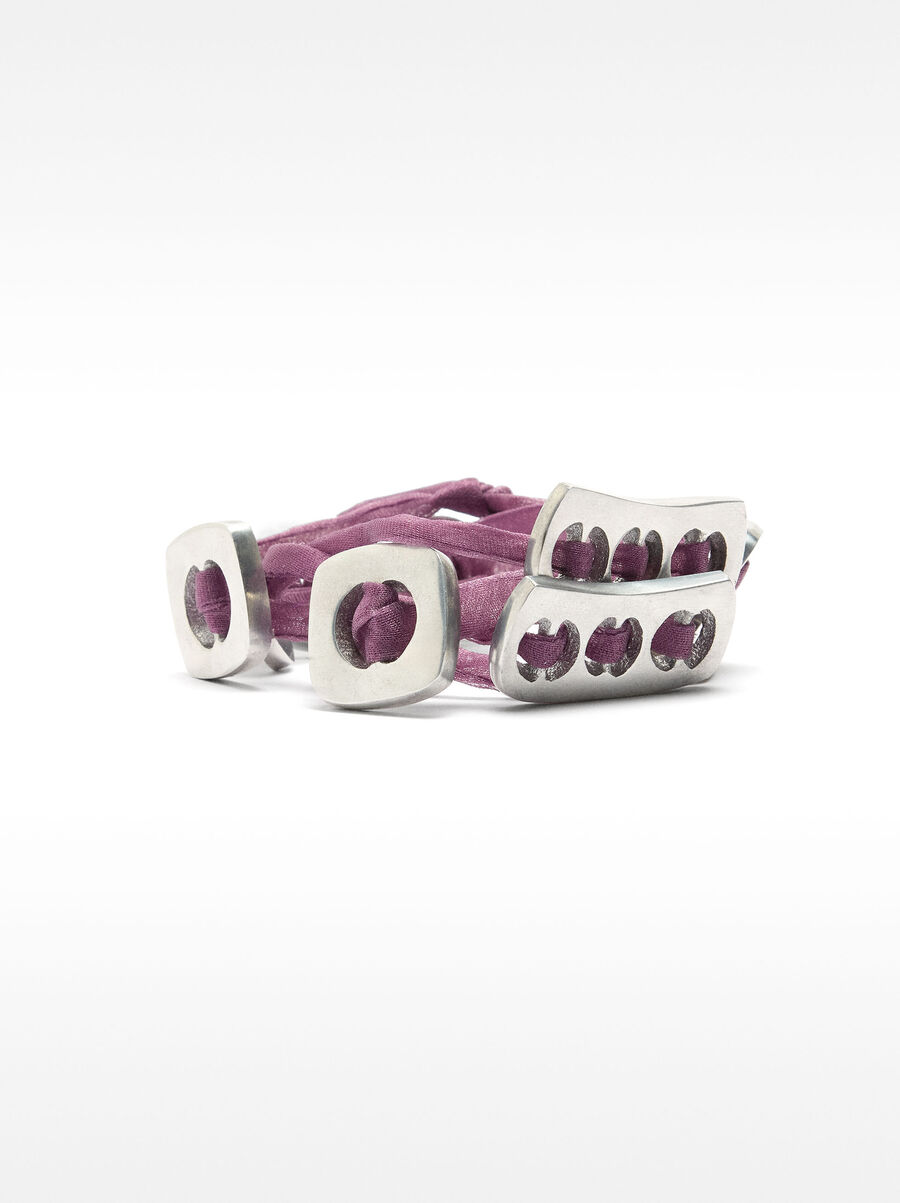 Cord bracelet with plates