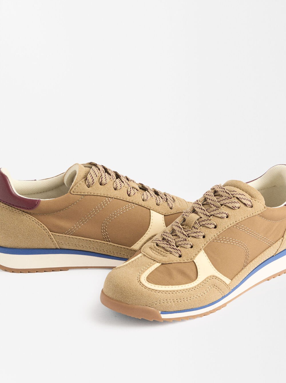 Combined sneakers with a suede effect