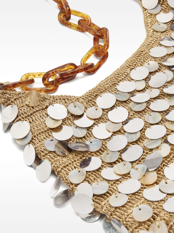 Shoulder bag with shells and sequins