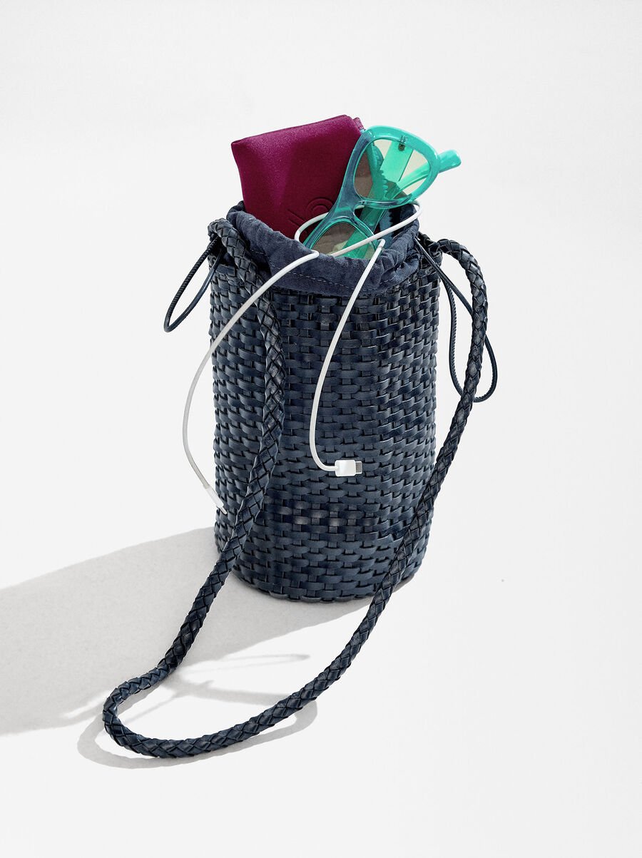 Bolso bombonera de piel trenzada