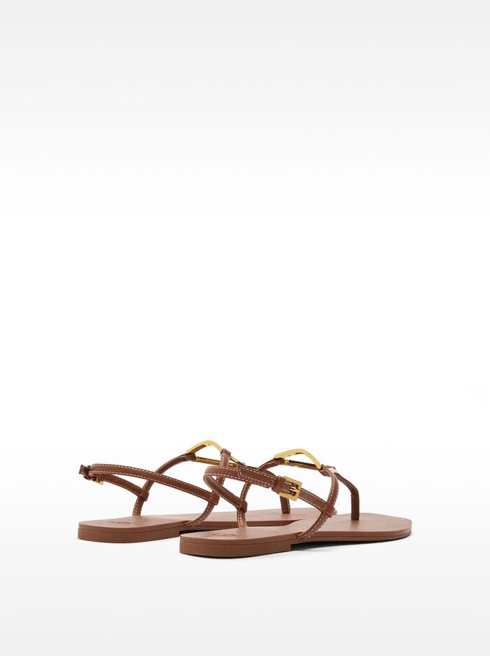 Flat sandals with metallic detail straps
