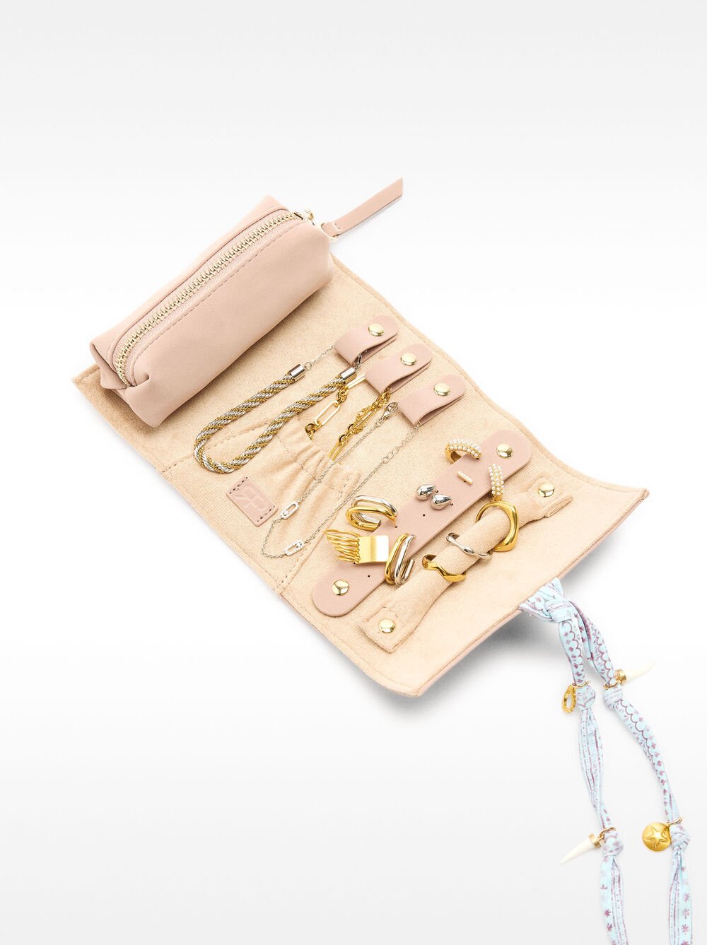 Rolled jewelry case with decorative ribbon