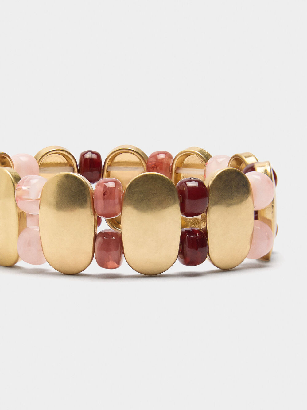 Elastic bracelet with stone-effect beads