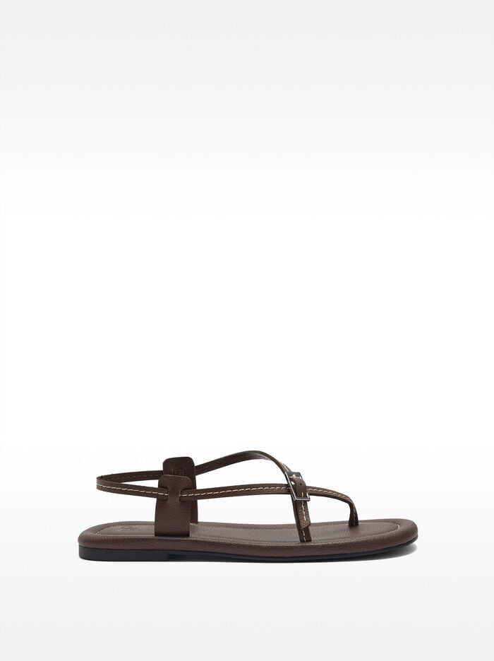 Flat leather sandals with thin straps