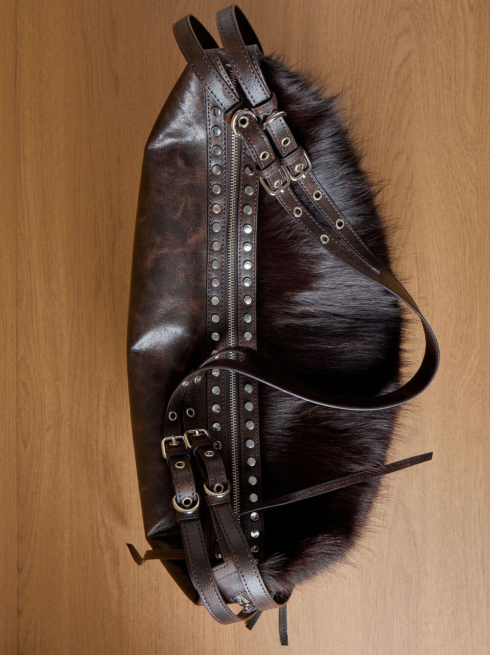 Bag with leather and studs details
