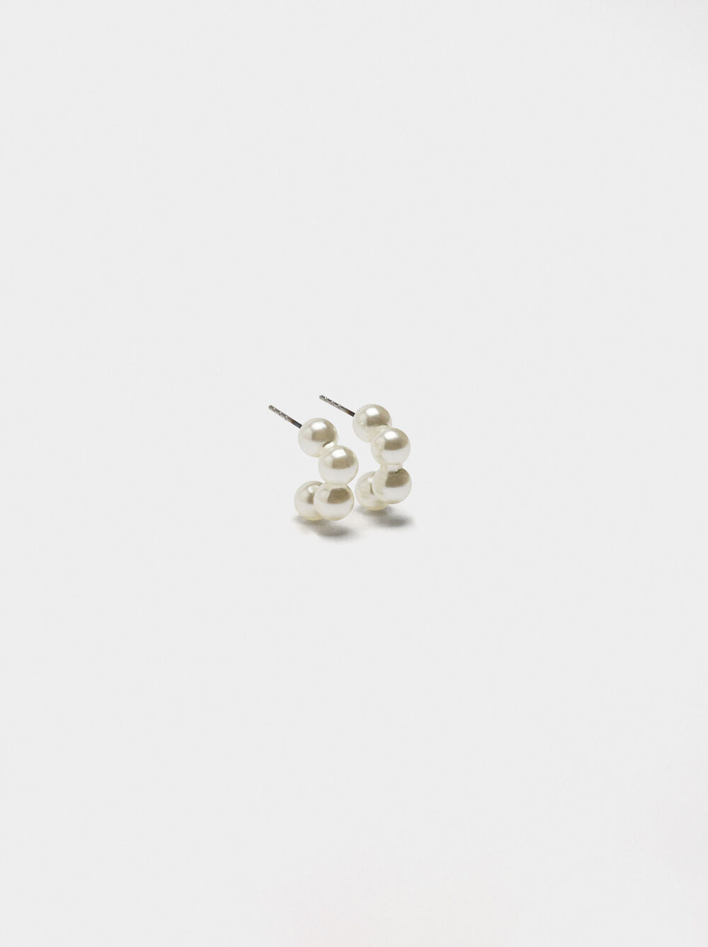 Créoles ouvertes avec des perles