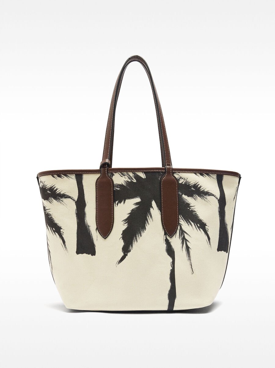 Shopper bag with reversible fabric