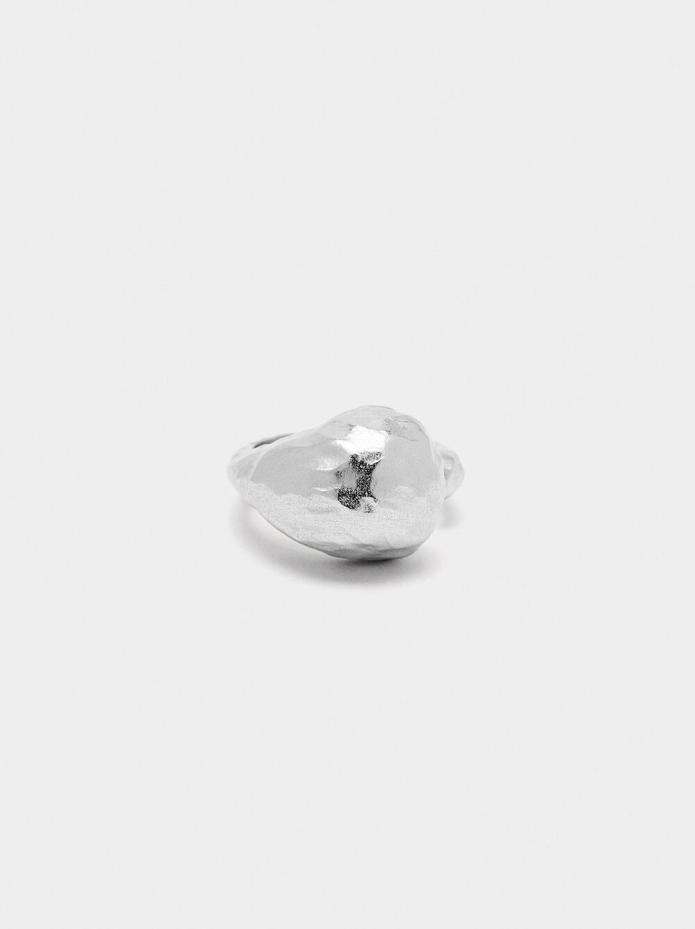 Open asymmetric ring
