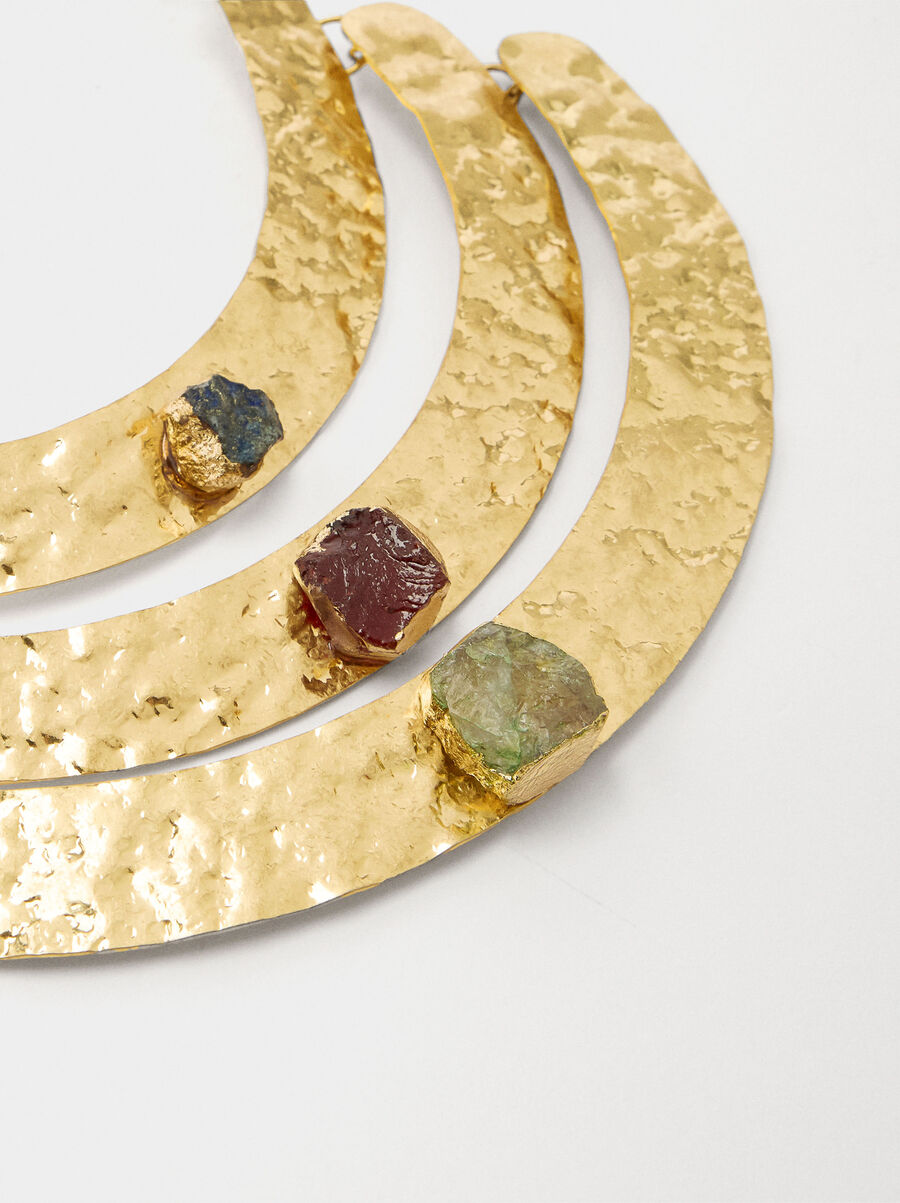 Triple necklace with arches and stones
