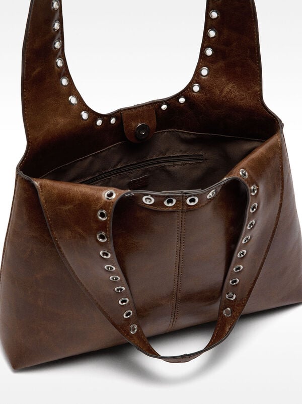 Crackle-effect shoulder bag with studs