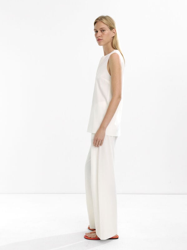 Pantaloni con tasche e zip