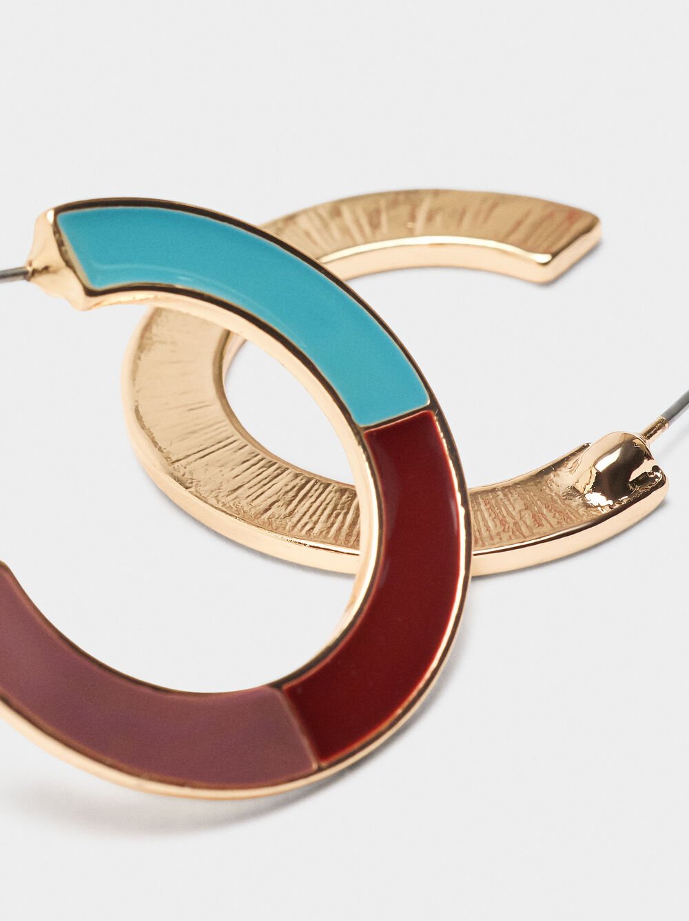 Open hoop earrings with enamel