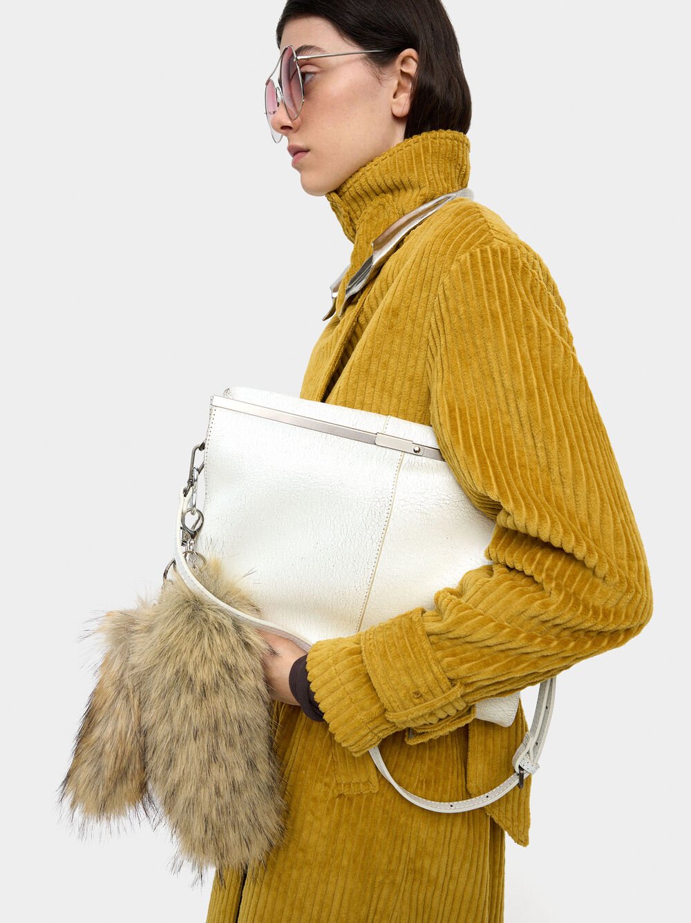 Shoulder bag with cracked leather