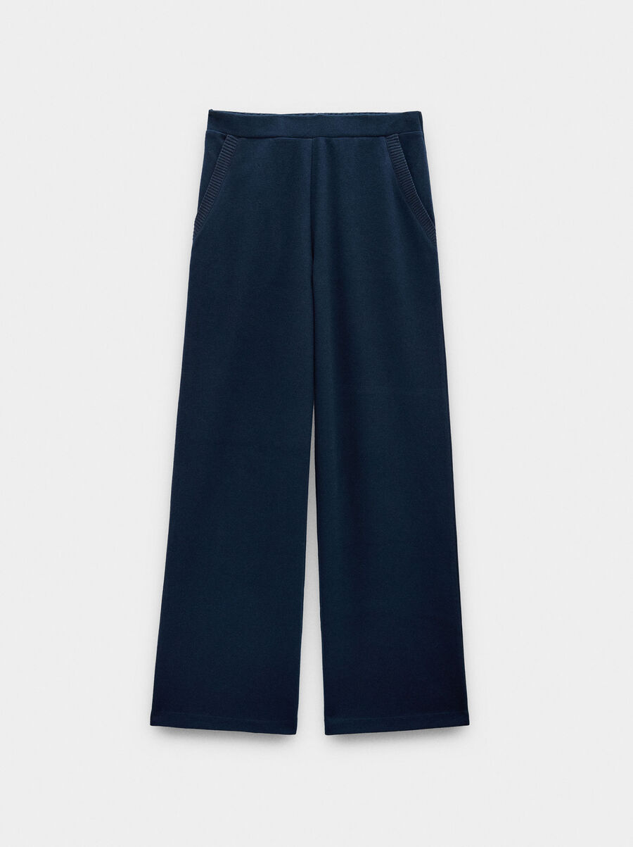 Pantalón fluido con bolsillos