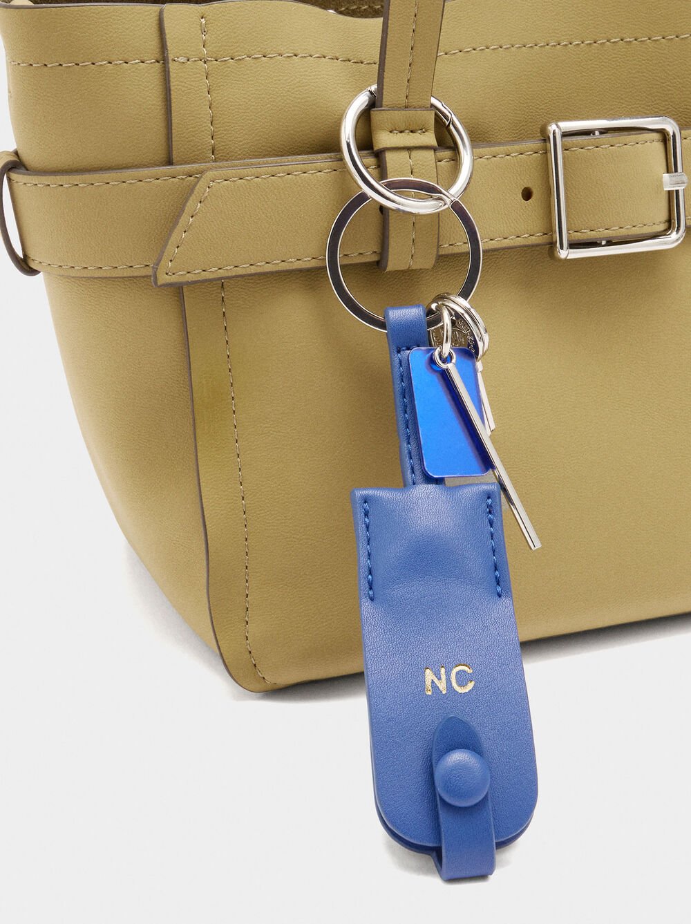 Tote bag with belt and pendant