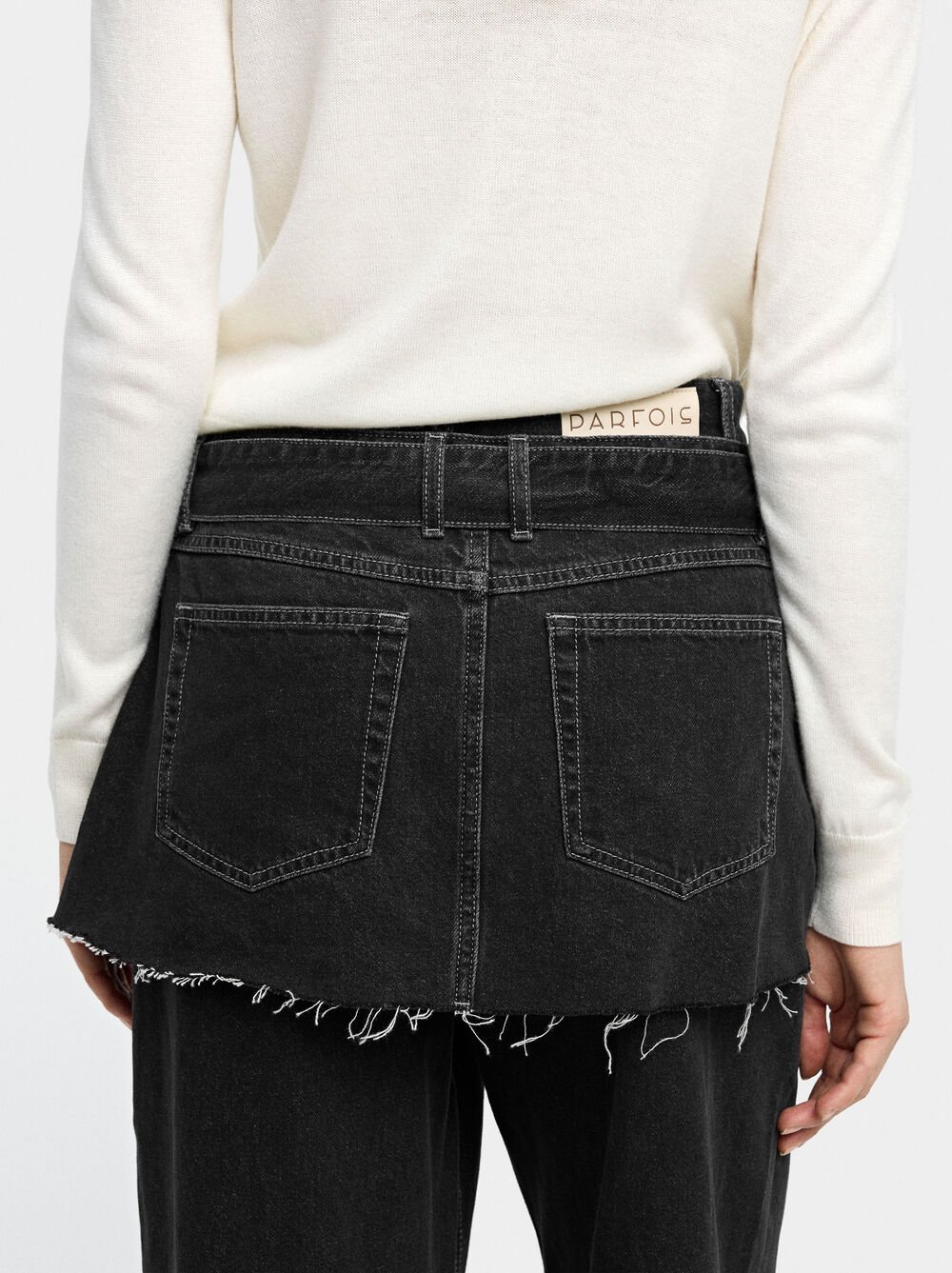 Straight denim trousers with skirt detail