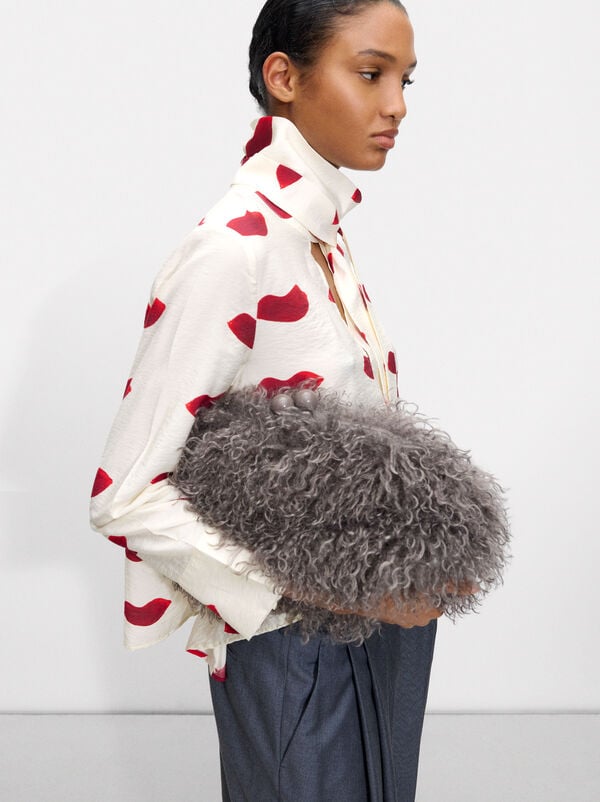 Faux fur effect handbag