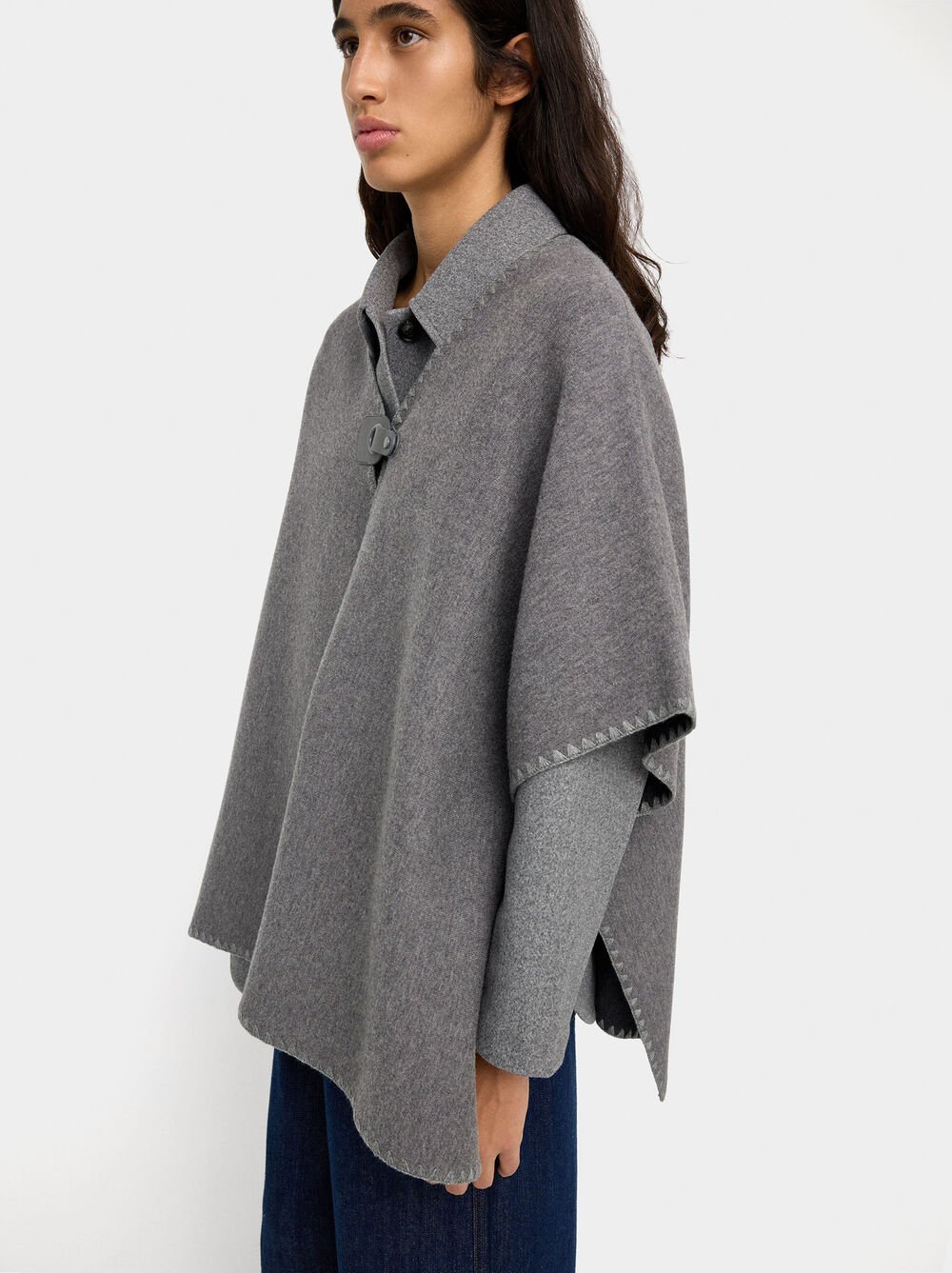 Poncho de malha com fivela