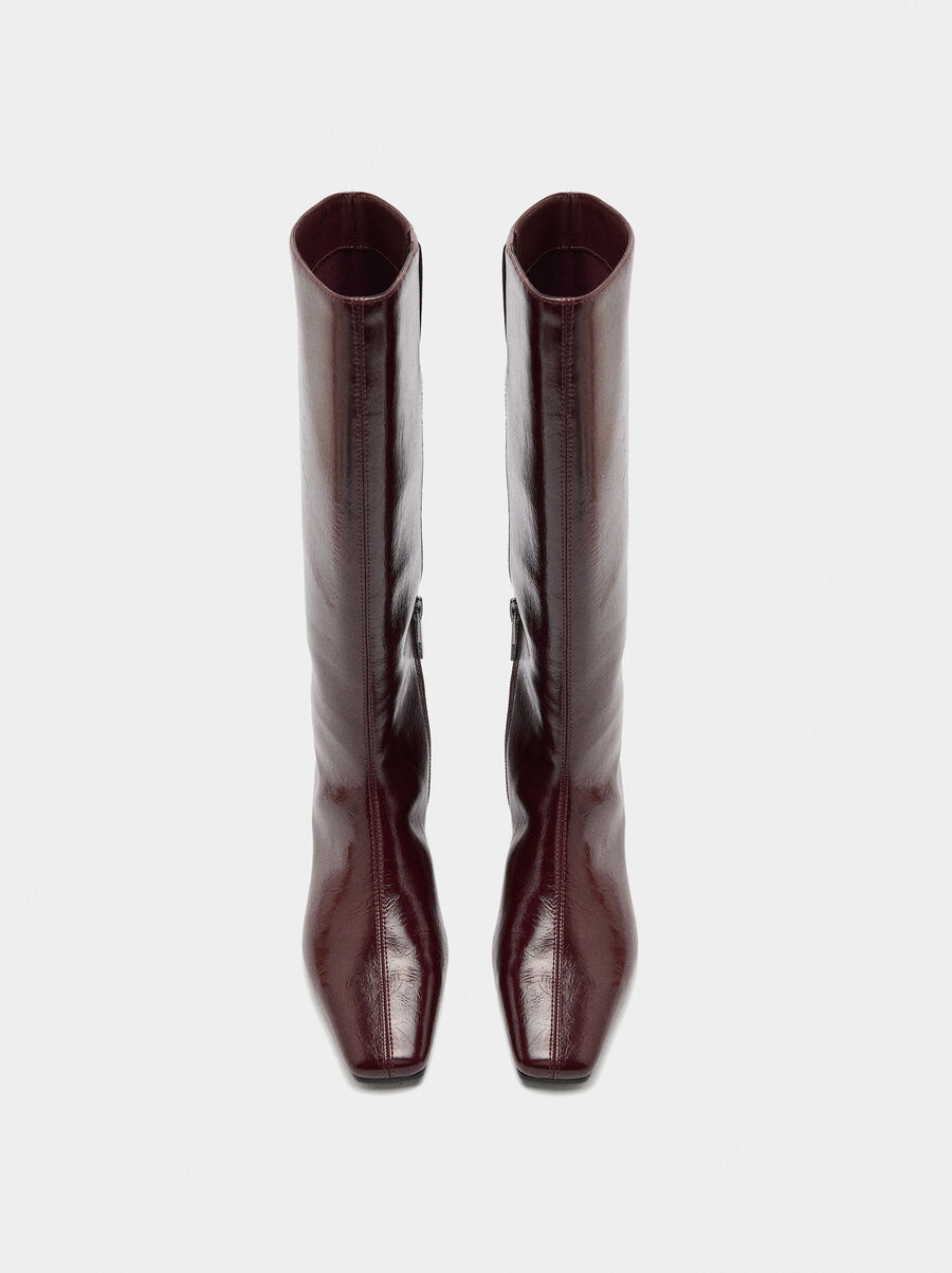 Patent high shaft boots