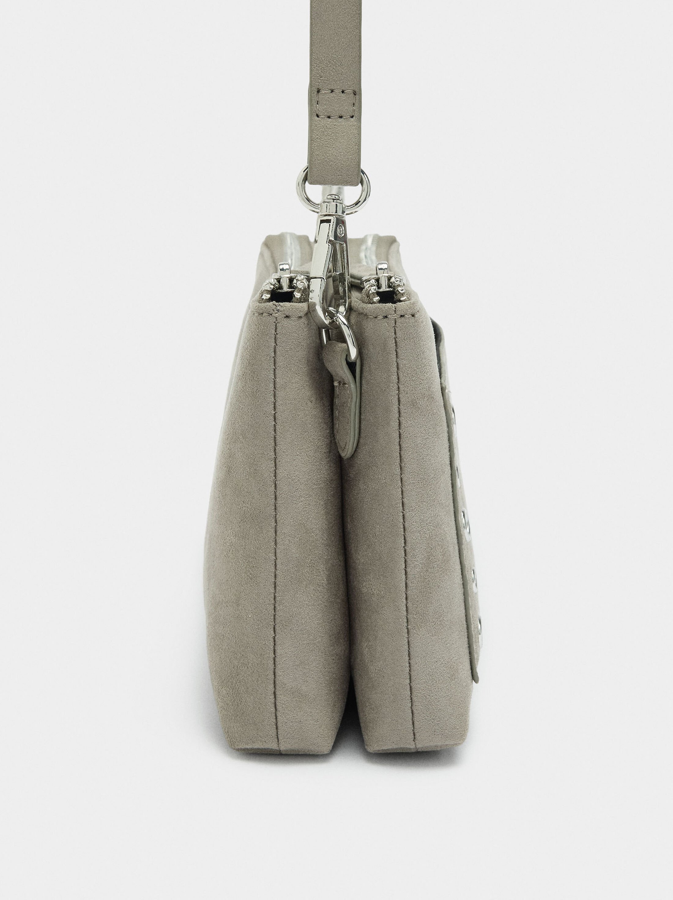 Crossbody bag with cracked effect and studs image number 1.0