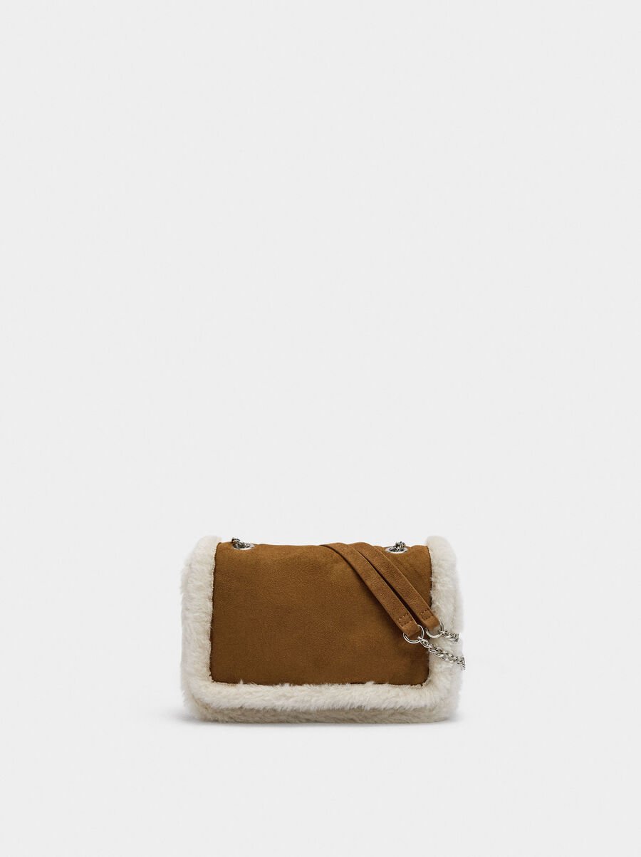 Shoulder bag with fur effect edges