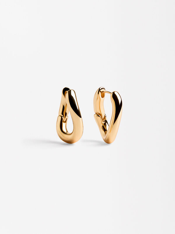 Oval gold hoop earrings