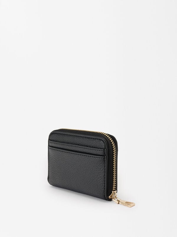 Coin purse with zip fastening