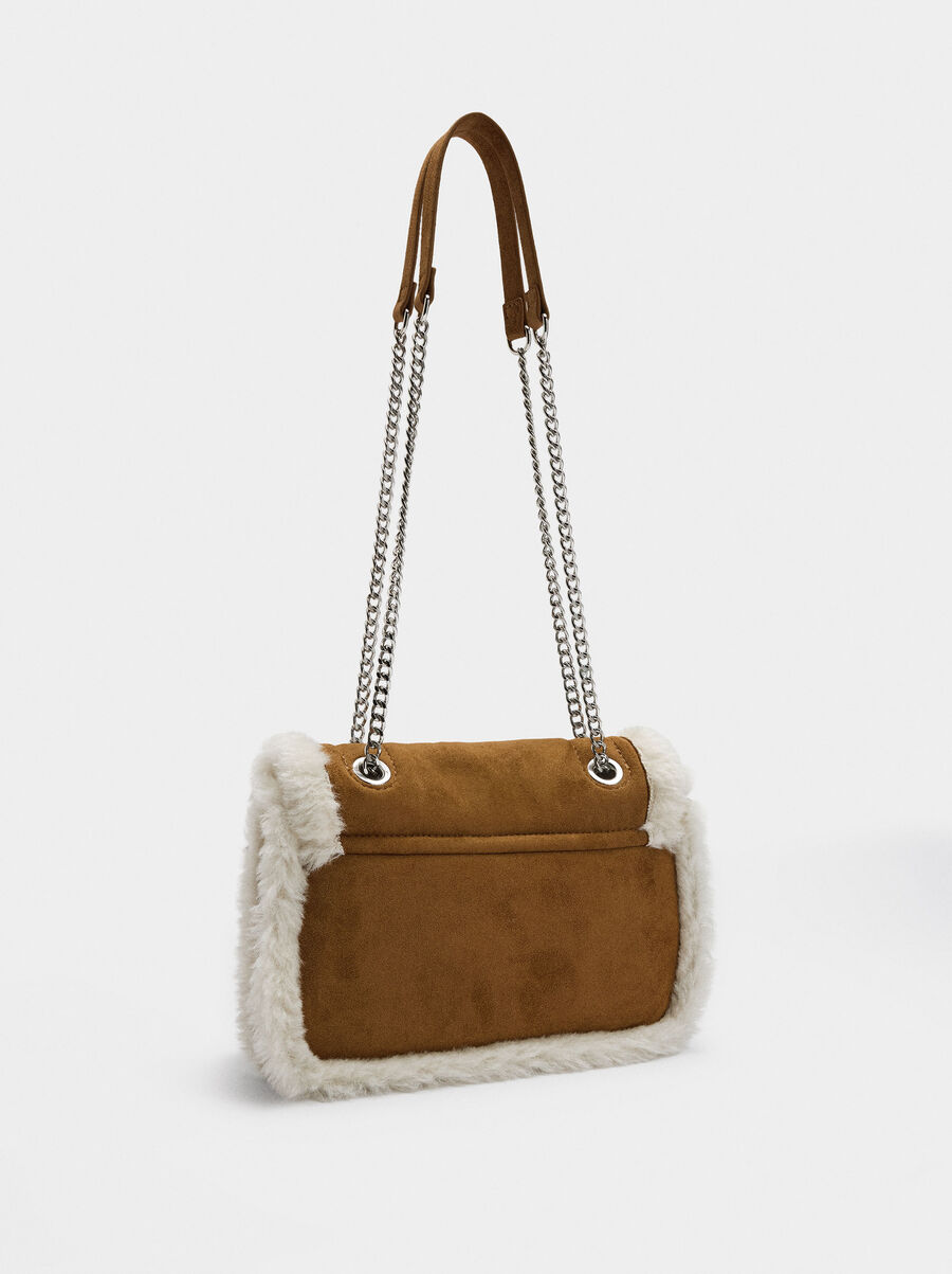 Shoulder bag with fur effect edges