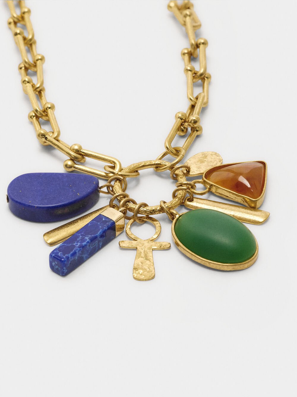 Necklace of links with pendant of stones