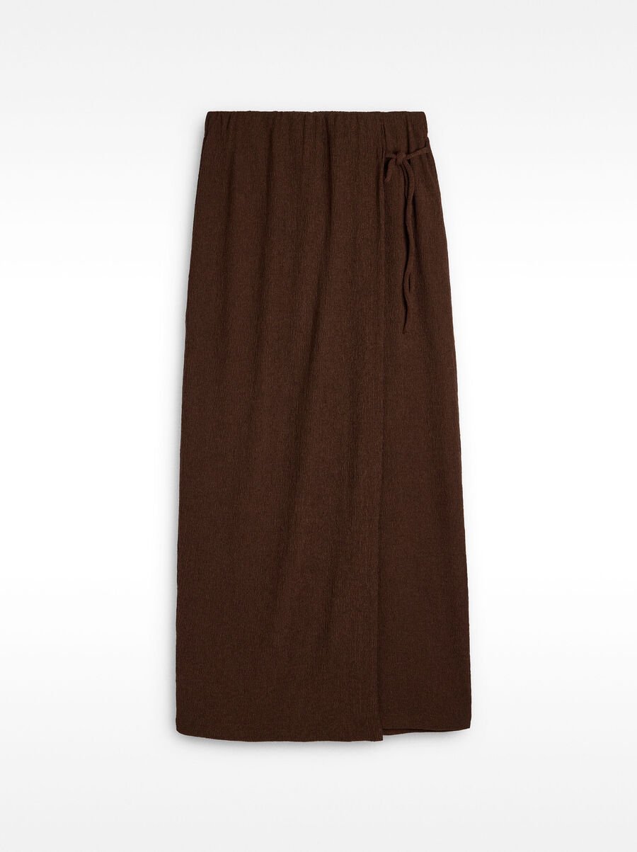 Trousers with crossover and texture