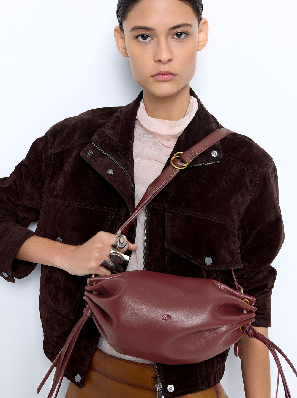 Crossbody bag with gathers