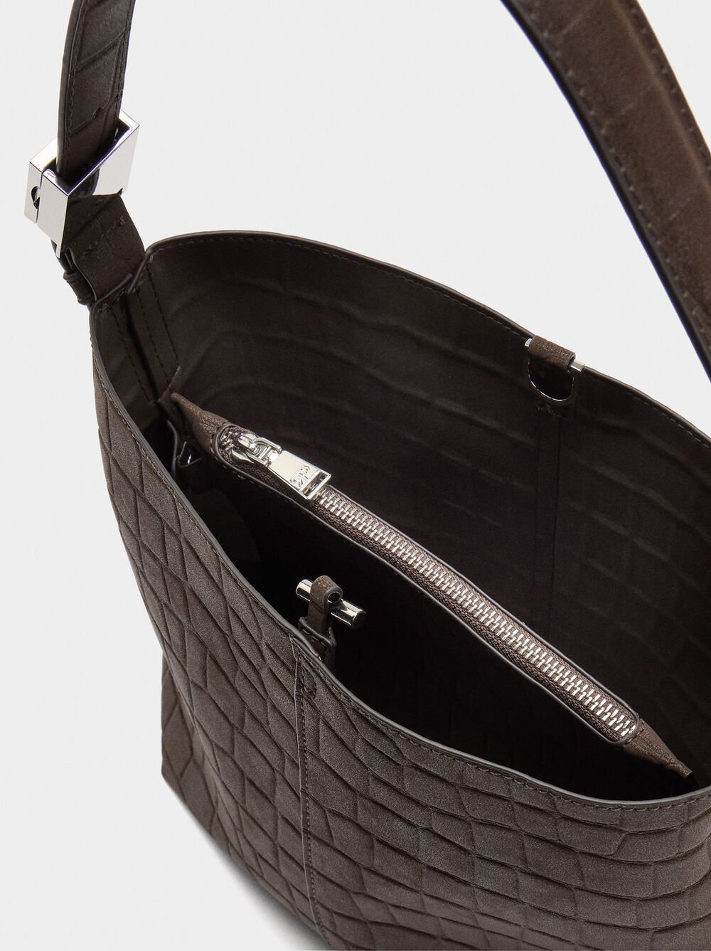 Shoulder bag with animal embossing