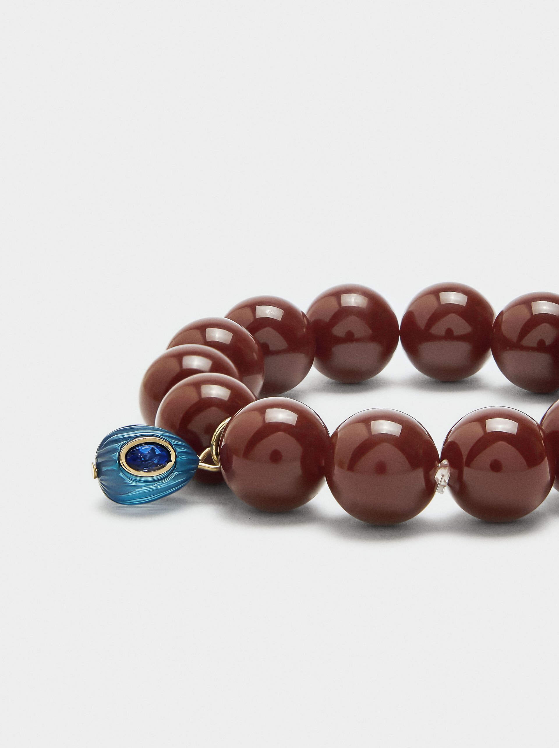 Armband aus Perlen mit Anhänger image number 1.0