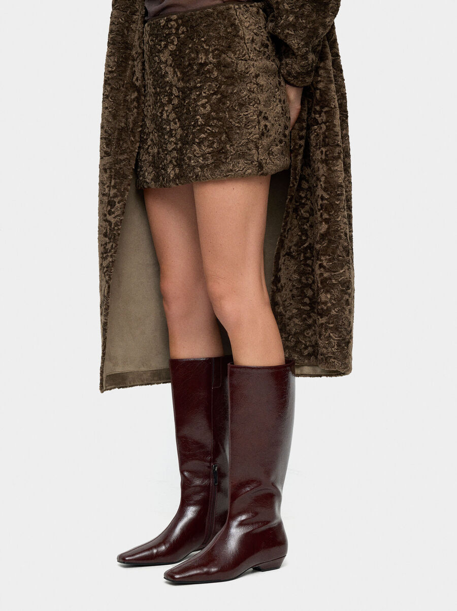 Patent high shaft boots