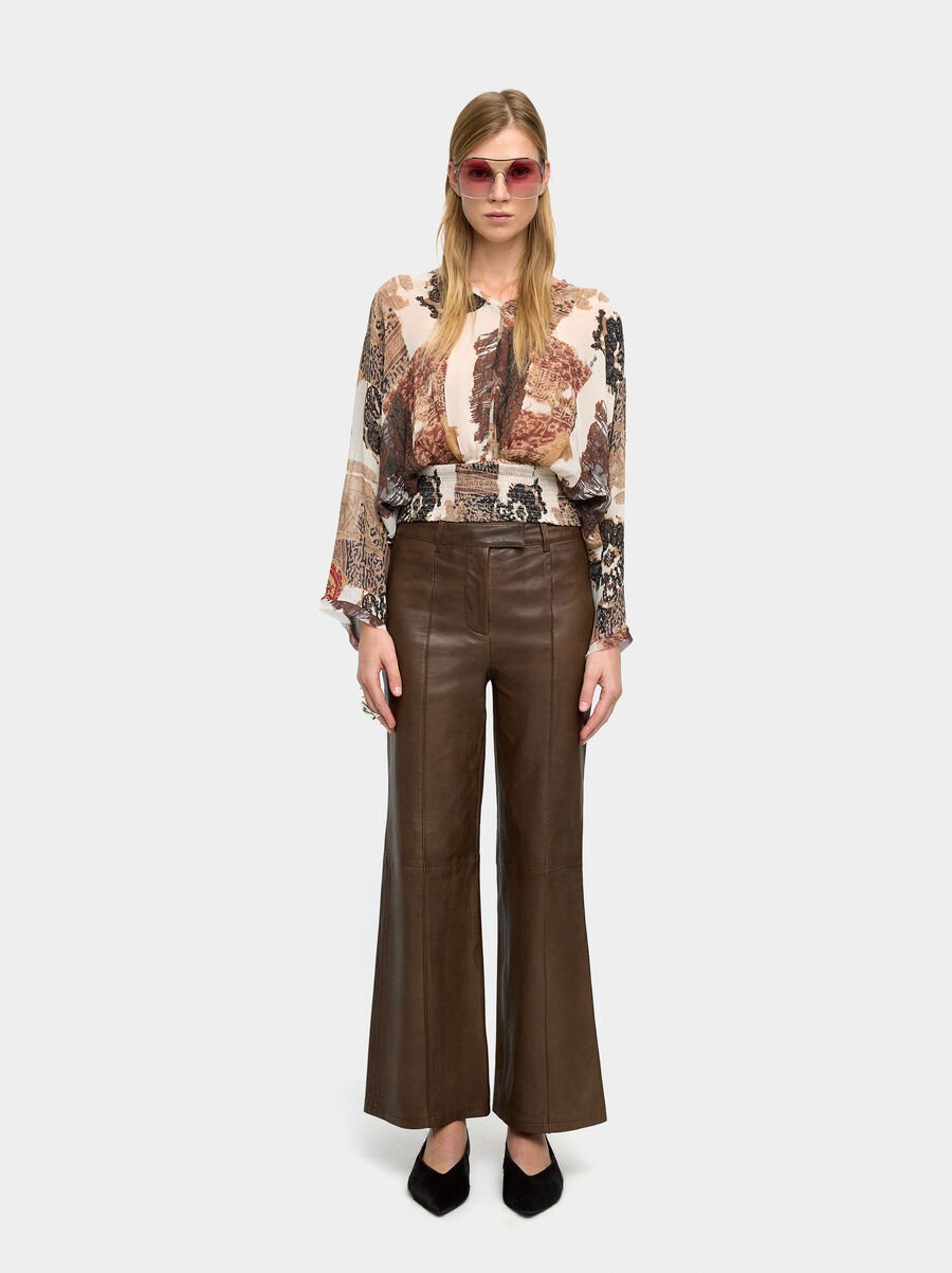 Blouse with semi-transparent print