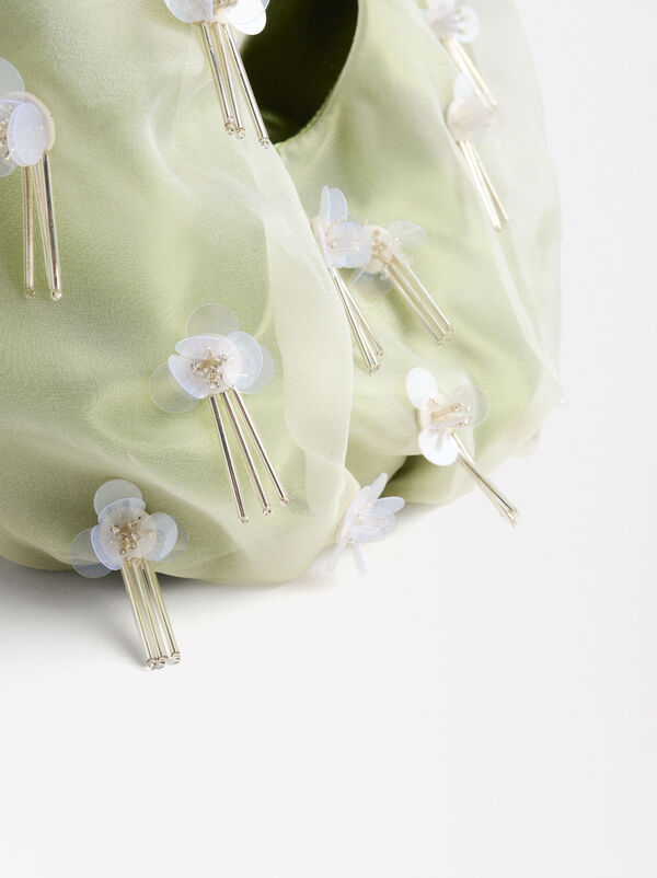 Fabric bag with floral applications