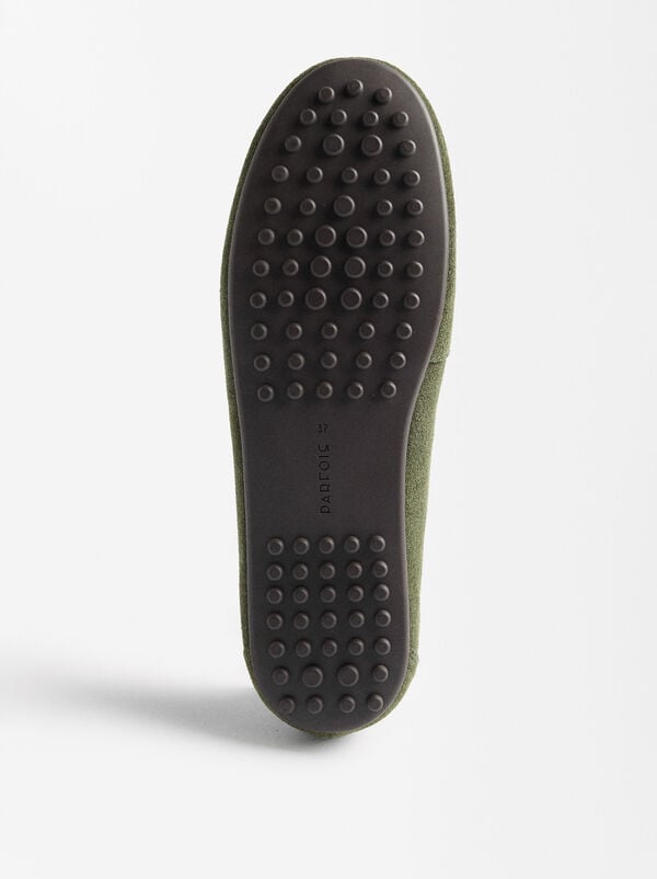 Leather moccasins with stitching