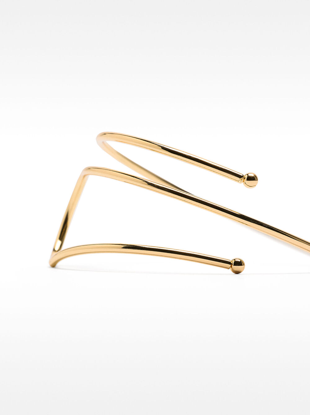 Polsera rígida creuada