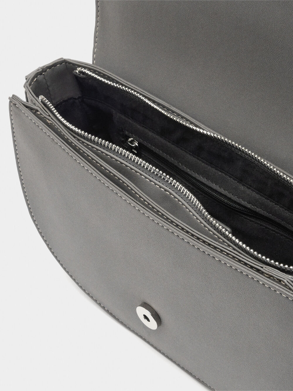 Oval crossbody bag with flap