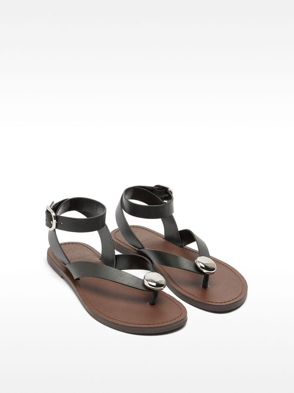 Leather flat sandals with metallic detail